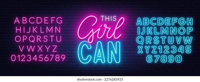 This Girl Can neon lettering on brick wall background.