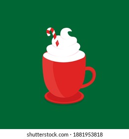 This is a hot chocolate with cream and candy cane isolated on the green background.