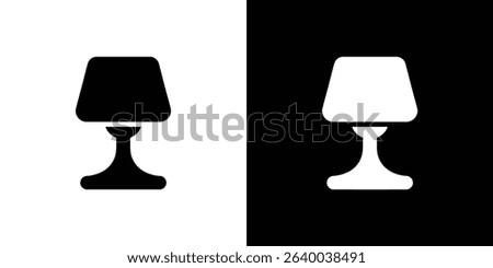 This image displays a desk lamp silhouette. One side of the image is black on a white background, while the other is white on a black background.