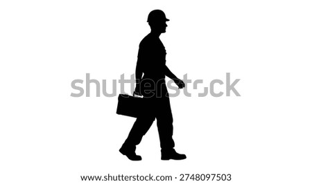 This image showcases a black silhouette of a worker carrying a toolbox, notable for its clean and striking silhouette style.
