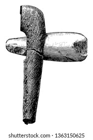 This image shows the stone Celt. It is mounted on a wooden handle that shows how these implements were used, vintage line drawing or engraving illustration.