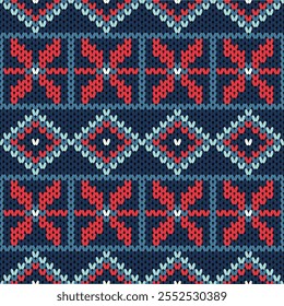This knitted pattern features red and light blue floral and diamond motifs on a dark navy background, creating a bold, symmetrical, and vibrant textile design.