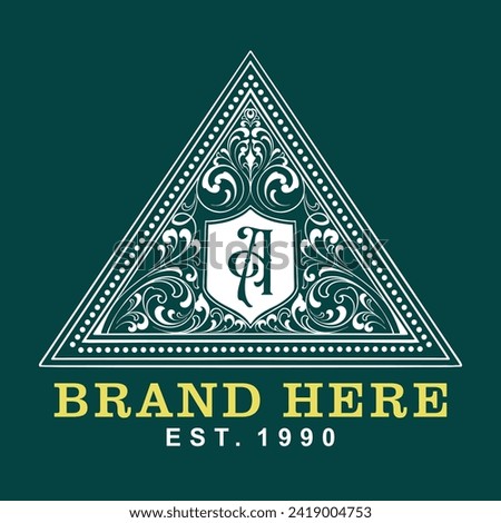 This logo features classic elements such as the crest and serif letters which create an elegant and dignified impression