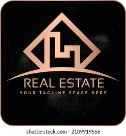 Este es el logo del diseño de vectores inmobiliarios