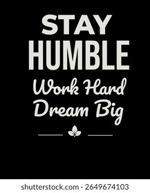 This minimalist black t-shirt inspires with the bold phrase “STAY HUMBLE,” paired with elegant script “Work Hard. Dream Big.” A small leaf icon adds a touch of nature, perfect for modern motivational 