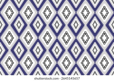 This pattern features alternating blue and white diamond shapes with black circular dot arrangements at the center. The sharp zigzag edges and minimalist detailing give it a clean, modern ethnic look.