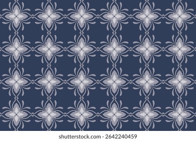 This pattern features symmetrical floral motifs arranged in a grid, creating a soft, geometric look in shades of blue and white.