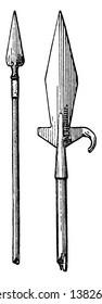 In this picture, there are two hunting spear from the 15th or 16th century which used for hunting at enemy or in game, vintage line drawing or engraving illustration.