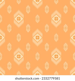 In this seamless pattern, orange flowers, petals stacked in gradients shades, arranged in a diamond frame around the frame decorated with small ovals next to each other, placed on orange background.
