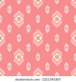 In this seamless pattern, pink flowers, petals stacked in gradient shades, arranged in a diamond frame, around the frame decorated with small ovals next to each other, placed on pink background.