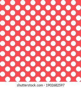 This is a seamless pattern of polka dots on a red background.