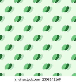 In this seamless pattern, three slanting and overlapping ovals, each of which is a green tone with a gradient of light and dark shades, placed on a green background. It looks strange and has dimension