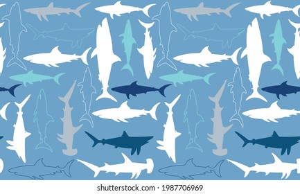 This shark-themed seamless vector pattern would make a great background or surface design.