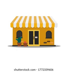 This is a small shop, yellow in color. 
Marketing concept, Small and Medium Enterprise (SME) concept.