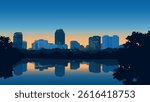 This vector illustration of the Orlando skyline at dusk captures the enchanting glow of the city as night falls.
