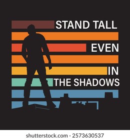 This vintage-style T-shirt design features a powerful and motivational message: "Stand tall, even in the shadows." The image showcases a figure standing confidently on a rooftop, symbolizing strength 