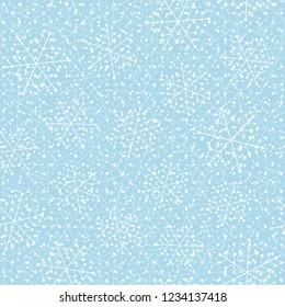 This is a winter seamless pattern with snowflakes. New Year and Christmas background. Vector illustration.