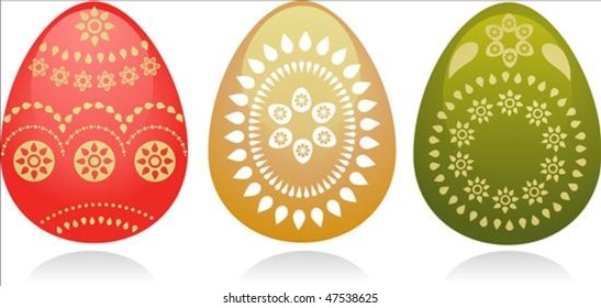 drei Ostereier mit goldenem Paisley-Design