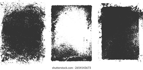 Three abstract textured shapes in dark grey with rough edges and scattered speckles on white.