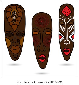 Three African masks in color. Vector illustration.