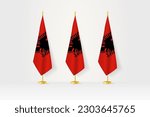 Three Albania flags in a row on a golden stand, illustration of press conference and other meetings. Vector illustration.