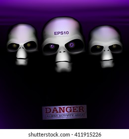Three alien humanoid faces on a dark background