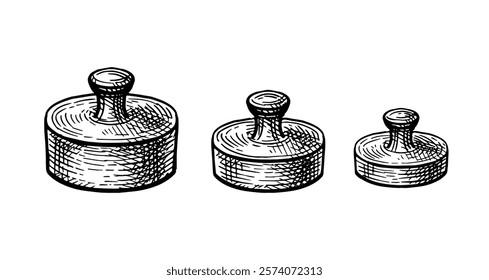 Three antique scale weights of different masses. Set of ink sketches isolated on white background. Hand drawn vector illustration. Retro style.