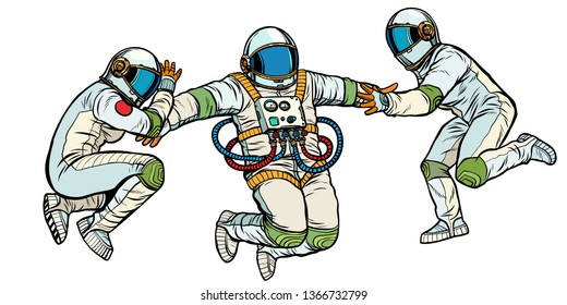 three astronauts in space in zero gravity. isolate on white background. Pop art retro vector illustration kitsch vintage