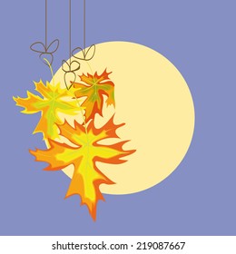 three autumn maple  leavse on moon background