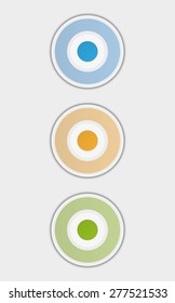 three badges or buttons with blue, yellow and green color, button have two color circles like a target, vector illustration