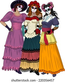 Three beautiful women friends stand hugging and posing as classical Graces dressed for Mexican Day of the Dead Masquerade with sugar scull makeup