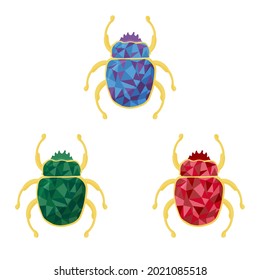 Three beetles of different colors in the form of brooches on a white background. Scarab beetle