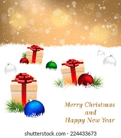 Three beige gift boxes with red bows, pine branches and multicolored Christmas balls on snow field on gold background
