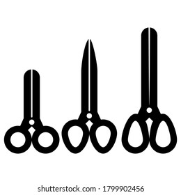 
three black scissors on a white background