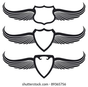 three black shields with wings