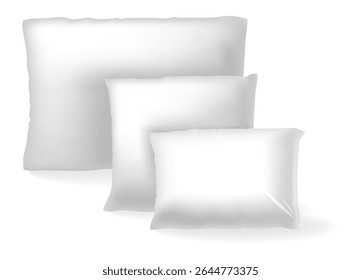 Three blank white pillows of different sizes standing on white background are waiting to be personalized with any design or logo, perfect for showcasing bedding products