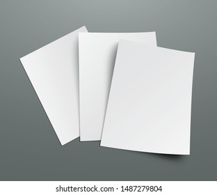 Three blanks of paper with shadows lie on a gray background. A4 paper page, mockup, sheet on the table - stock vector