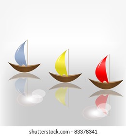 three boat with colorful sails