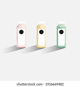 three bottles of juice on a white isolated background