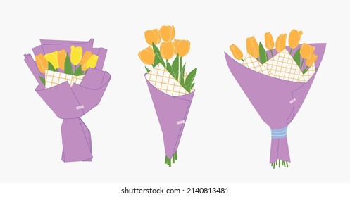 Three bouquets of yellow Tulips in purple wrapping paper. Bouquet of spring fresh flowers wrapped in craft paper. Beautiful lush tulips for Mother's Day. Holiday floral decor. 