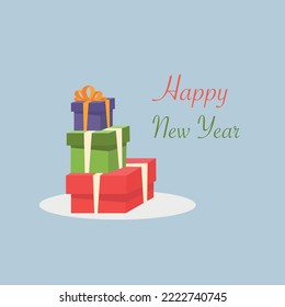 Three boxes standing on top of each other. Happy New year text.