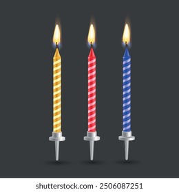 Three bright candles painted in a pattern of yellow, red and blue stripes burn against a dark background, creating a festive and carefree atmosphere.