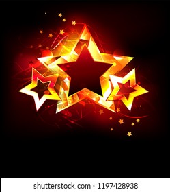 Three bright, hot, fiery stars on black background.
