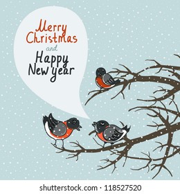 Three bullfinches sitting on the branches - Christmas postcard