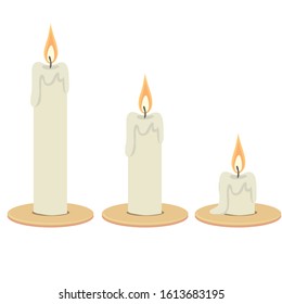 three candles with flames of different lengths