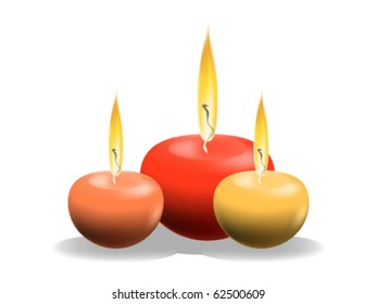 Three candles isolated on white background
