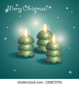 Three candles in the shape of a Christmas tree on a green background with light flares 