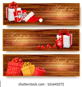 Three christmas banners with gift boxes and santa hat. Vector illustration