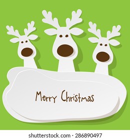 Three Christmas Reindeer white on a green background