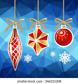 Three Christmas toys on a blue polygonal background.